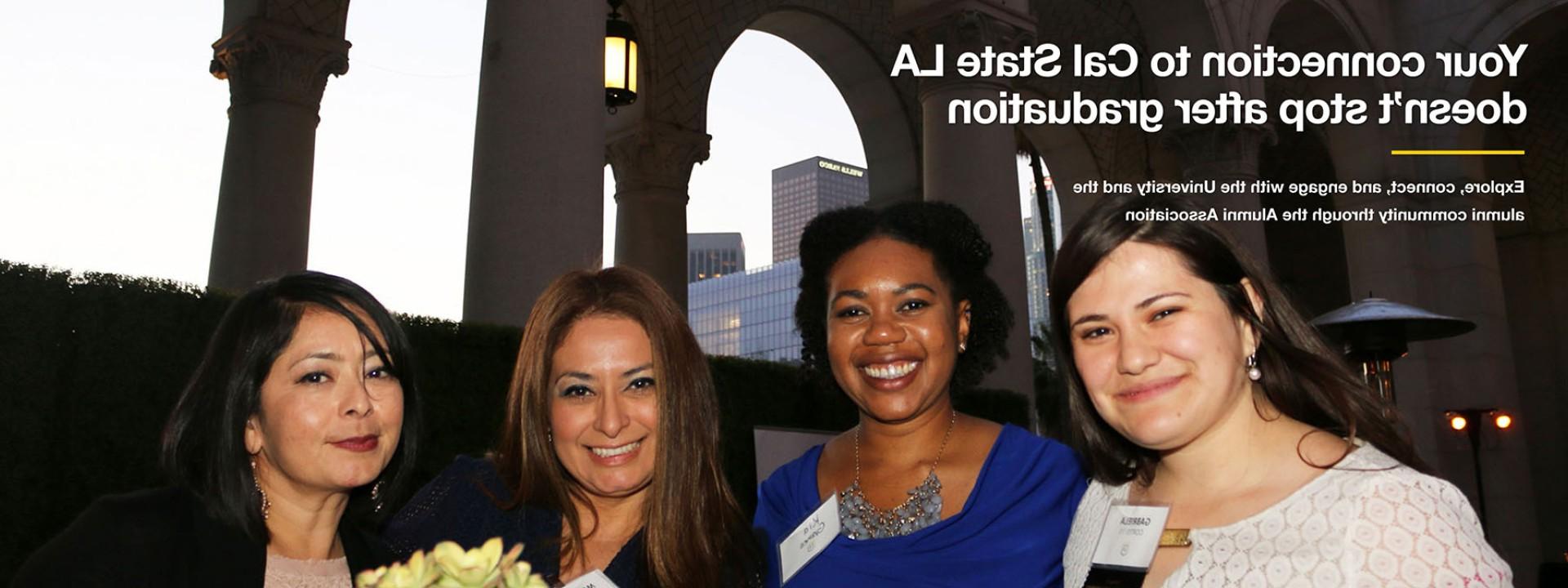 Four alumnae posing together. Overlaid text reads: Your connection to Cal State LA doesn't stop after graduation. Explore, connect, and engage with the University and the alumni community through the Alumni Association